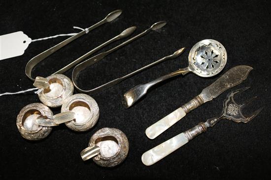 2 prs Geo silver sugar tongs, 4 cast white metal miniature ashtrays, 6 silver handled butter knives & set fruit eaters (cased) etc